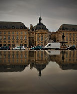117 Place de la Bourse reflected in the 