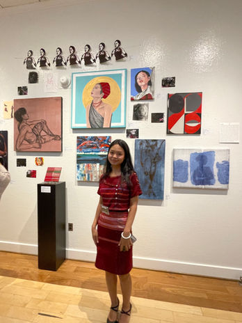 Lee Meh, 2023

Even after spending more than half of my life in the United States, I still feel disconnected and uncertain about my surroundings. A descendant of minorities who have been involved in civil war for over 75 years and are still ongoing. My parents are from Myanmar
(Burma), but we never considered ourselves Burmese because its militaries were
continually trying to clear us out. In the mid-1990s, my parents fled to a Thai refugee camp, where I was born. My entire world, my home, and the happiest place to be was the
refugee camp. Little did I know about the outside world, and even less did I know about my parents' struggles while trapped in that camp. I wasn't introduced to the arts until I
was in my teens, but my father's perfectly rounded words and house drawings for his kindergarten class captivated me. In 2009, we moved to the United States and settled in
Winston-Salem. Fine arts were not a big part of my life until I went to Salem College. As a studio art student, I spent the majority of my time assisting in my Karenni community and with the Karenni people. I'm working with different media and trying to find my style by
drawing inspiration and subjects from a Karenni sub-group named Kayah. I have been concentrating on telling my stories as a refugee and my culture as a Kayah (Karenni) young adult living in a third-world country through my artwork. I'll keep searching for my style while focusing on reflecting on my culture and the unwritten stories of my people. My purpose with my work is to portray my roots and stories through it.