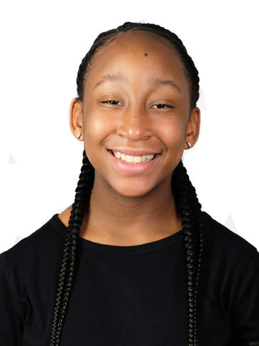 A young student with long dark black-brown braids smiles at the camera in a black shirt against a white background