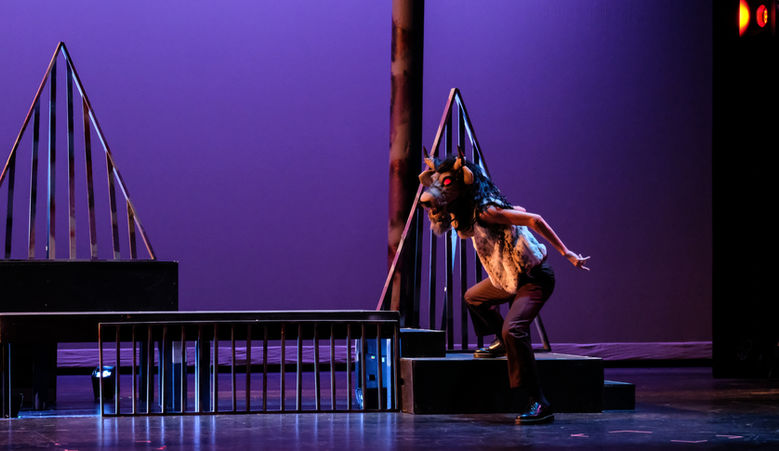 Person in a Minotaur head with glowing red eyes. Reference to The Lightning Thief