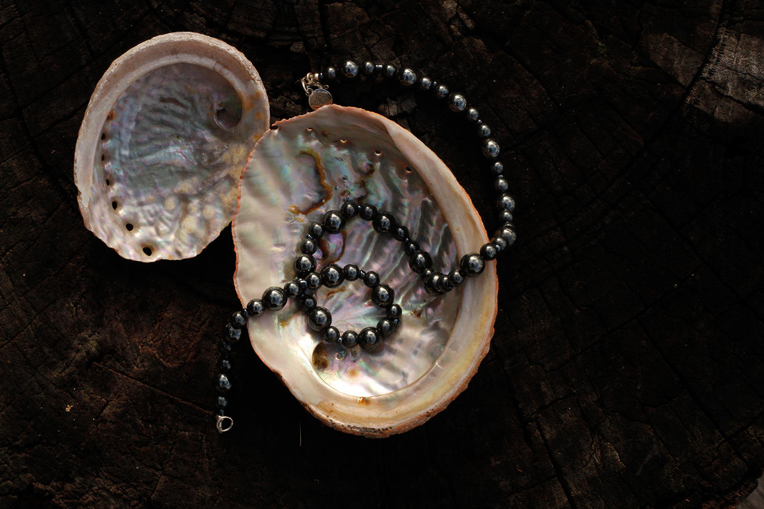 Hematite bead necklace with abalone shell