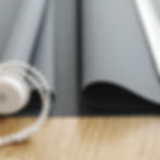 Grey blinds on a wooden table