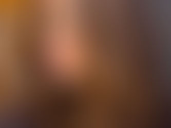 Layered caramel highlights on medium brown hair with a smooth, voluminous haircut — precision blowout from Nousha’s Hair Studio in Mequon, WI.