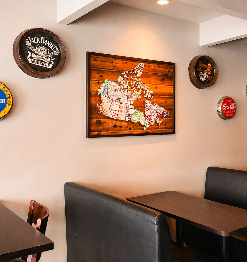 The Gusto Pub at Gusto Caledon with multiple televisions and a full bar