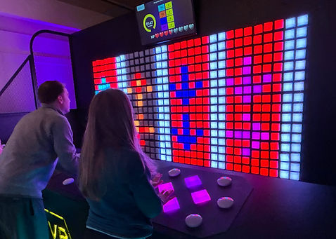 two players enjoy light based control game