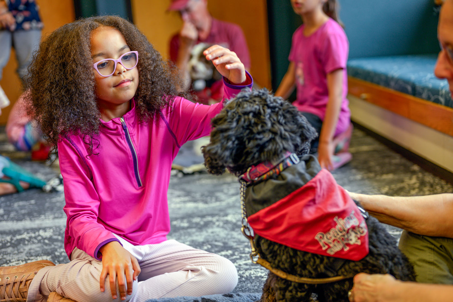 Mill Creek library Rover Reading children dogs volunteers
