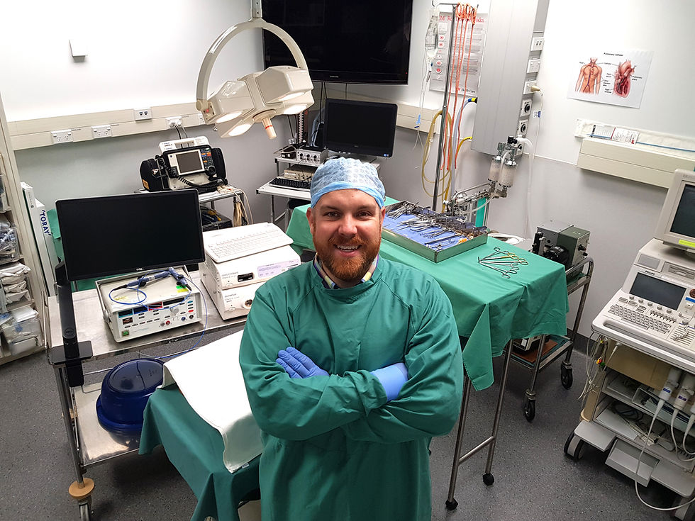 Dr Tim Angeli-Gordon stands in the TARGET lab for GI research with surgical instrumentation