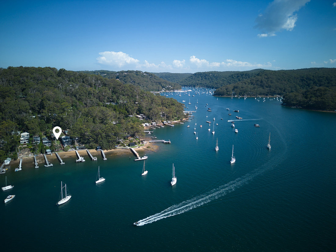 Aerial view of Scotland Island surrounded by Pittwater