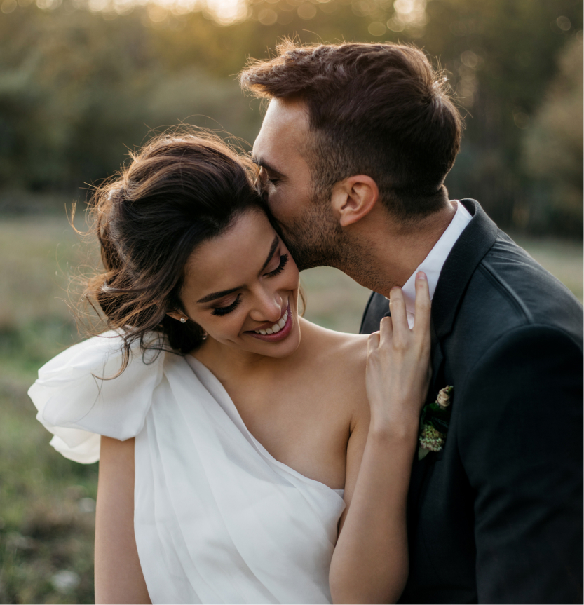Photo filters tool displaying a wedding couple’s portrait in full color, showing a warm, romantic outdoor moment.