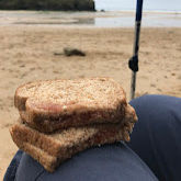 Jam sandwich on beach