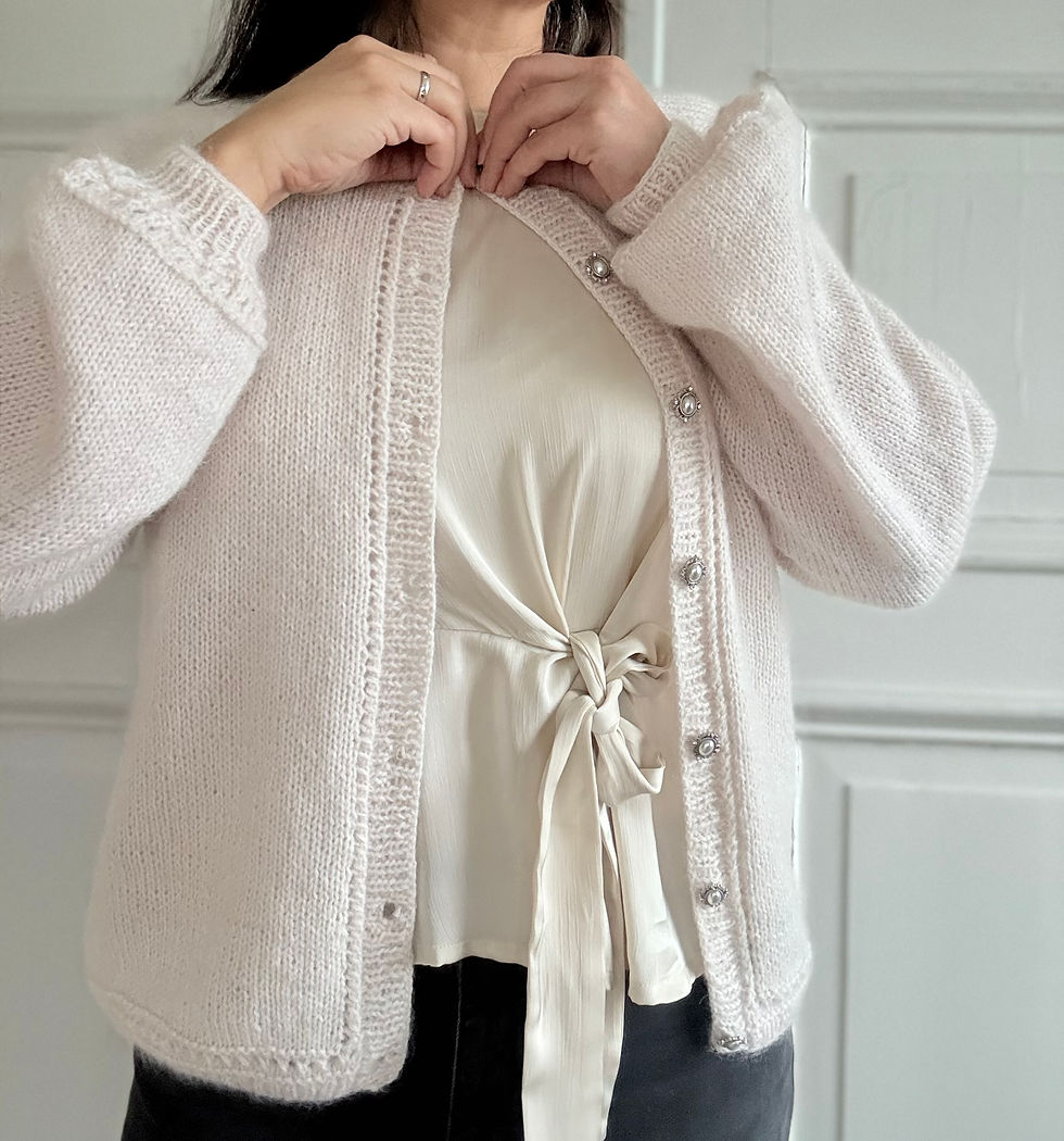 Thumbnail: Summer Snowflake Cardigan by MyChicKnits — a simple knitting pattern by Marthe Øyrås featuring eyelet pattern & vintage feel.