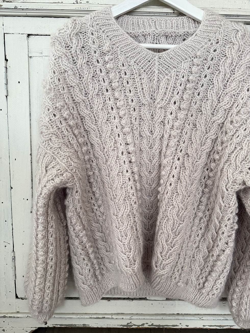 Thumbnail: Frostberry Sweater by MyChicKnits — a textured knitting pattern by Marthe Øyrås with cables and bobbles.