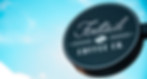 A round, Foxtail Coffee logo sign photographed with a bright blue sky in the background.