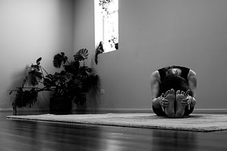 Woman in Paschimottanasana