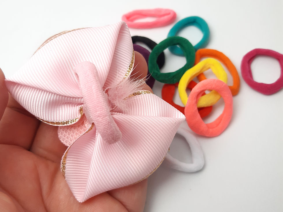 Adicionar xuxinha de pano no laço