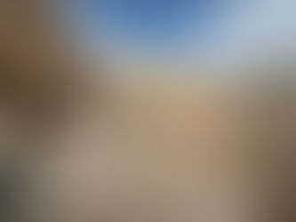 Climbers Walk To The Belay In Red Rock