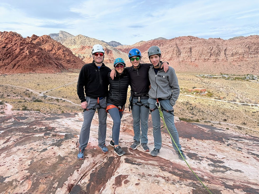 Eye-level view of a guidebook open to Red Rock Canyon climbing routes