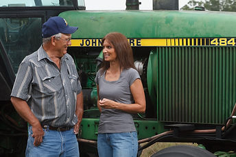 Dad and I next to tractor3.jpeg