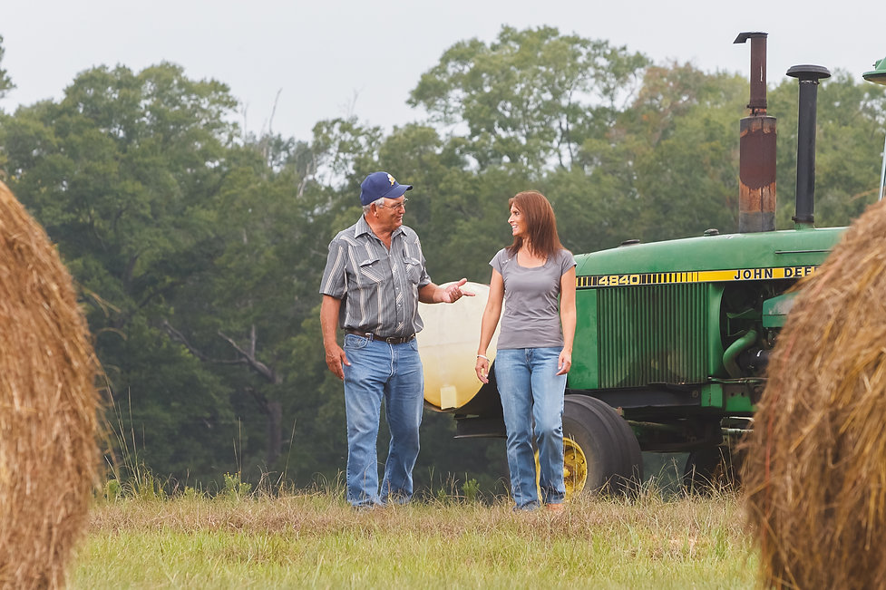 Dad and I walking in hay field2.jpeg