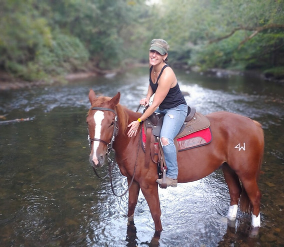 Rachael riding her horse