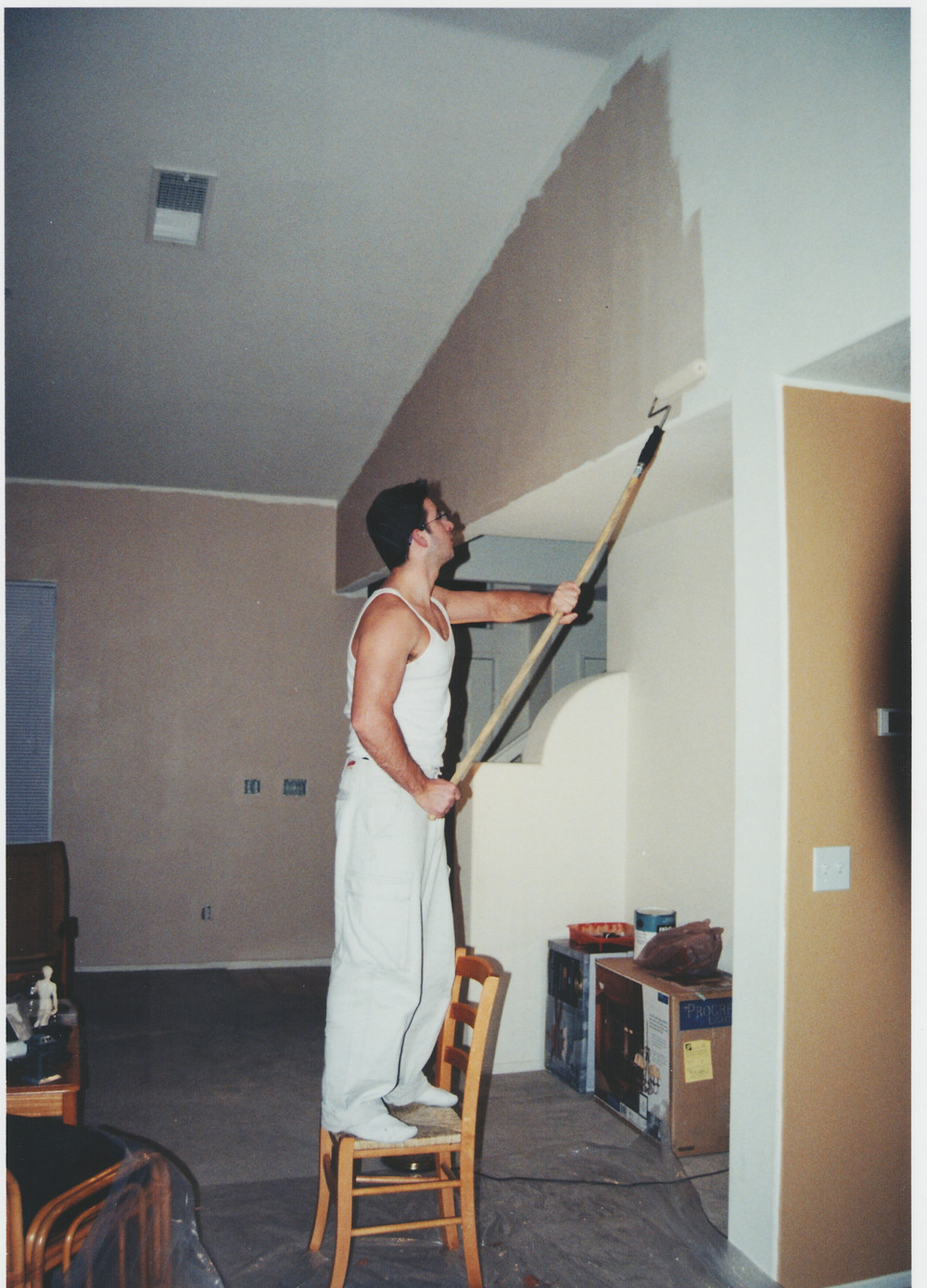 The Albanian Painting a Wall