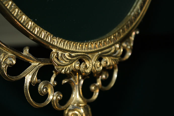 Antique brass mirror
