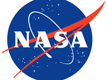 nasa logo with blue circle speckled with stars