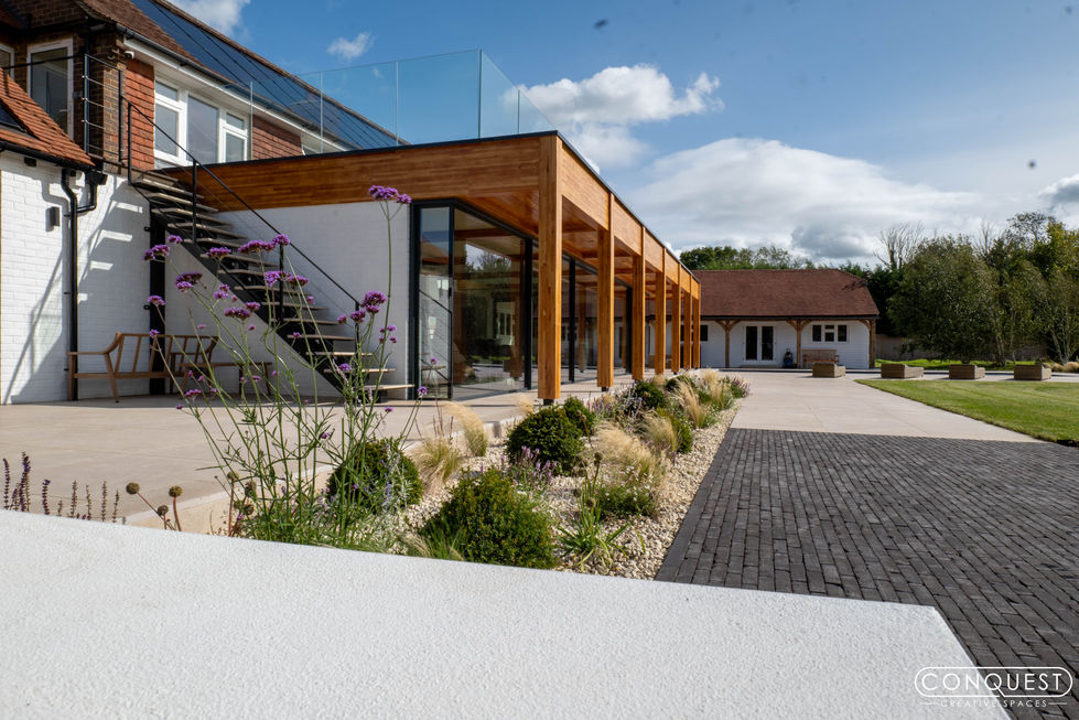 a house with purple flowers in front of it