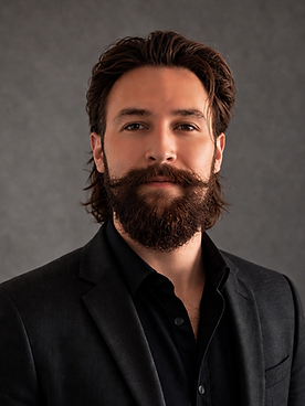 New Headshot May 2026.PNG