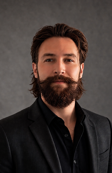 New Headshot May 2026.PNG