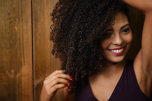 woman of color smiling