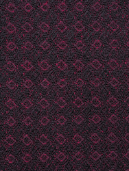 The burgundy tuxedo fabric close up shot.