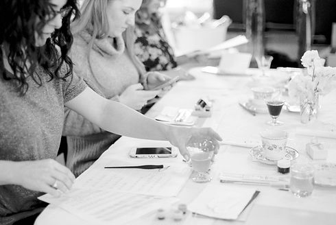 Ladies learning calligraphy at a Seattle Calligraphy workshop with Bespoke Strokes Calligraphy