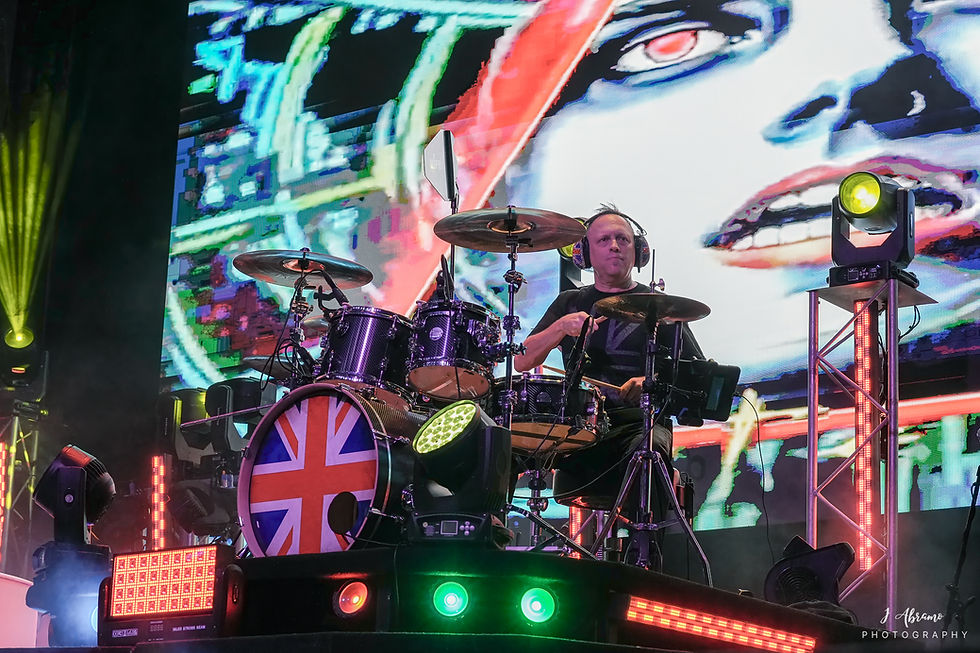 Jay, the drummer, with Union Jack drum kit on stage