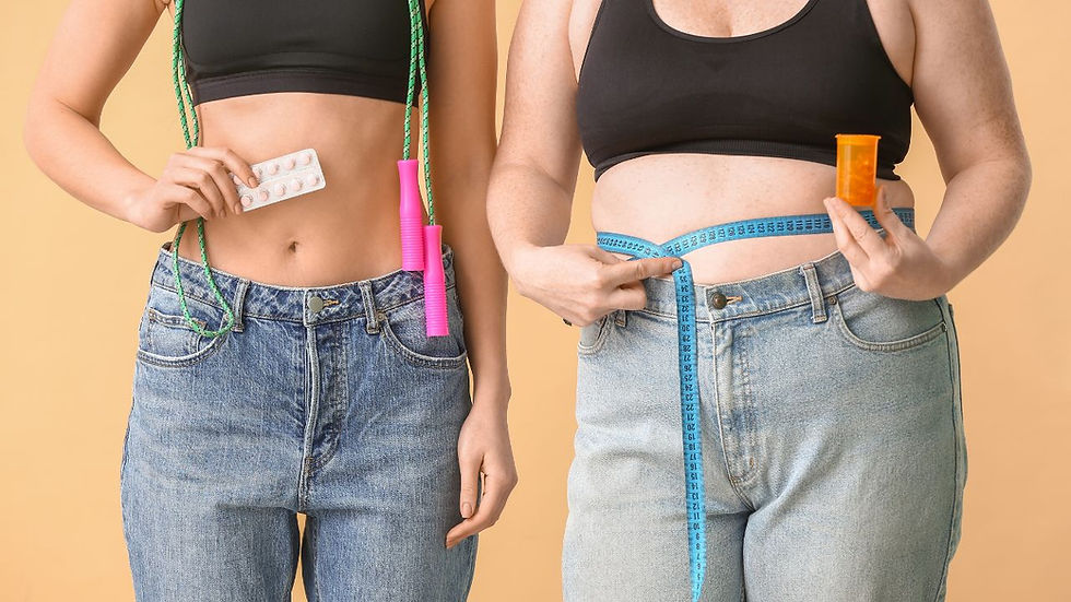 Two women in jeans and black tops hold measuring tapes and medicines. One has a jump rope. Tan background. Focus on weight loss tools.