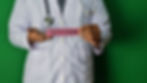 Doctor in a white coat and stethoscope holds a pink card reading "TESTOTERONE" against a green background.