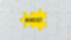 Gray puzzle with a missing piece reveals a yellow section with the word "MINDSET," conveying focus and innovation.