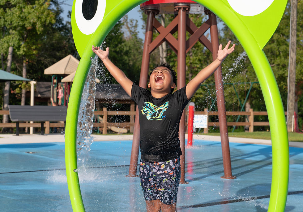 Calhoun County - Blountstown - Splash Pad - Young Boy Playing