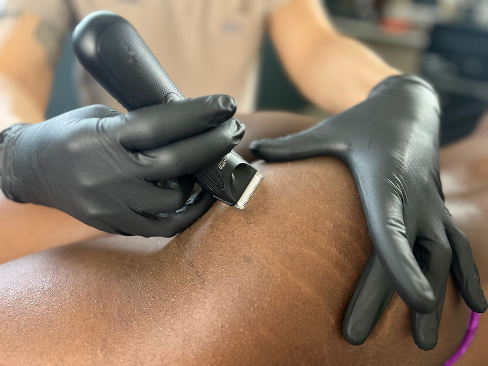 (Trim treatment on glutes): “BootyBossLA technician preforming a trim to a client’s glutes for smooth and hair-free