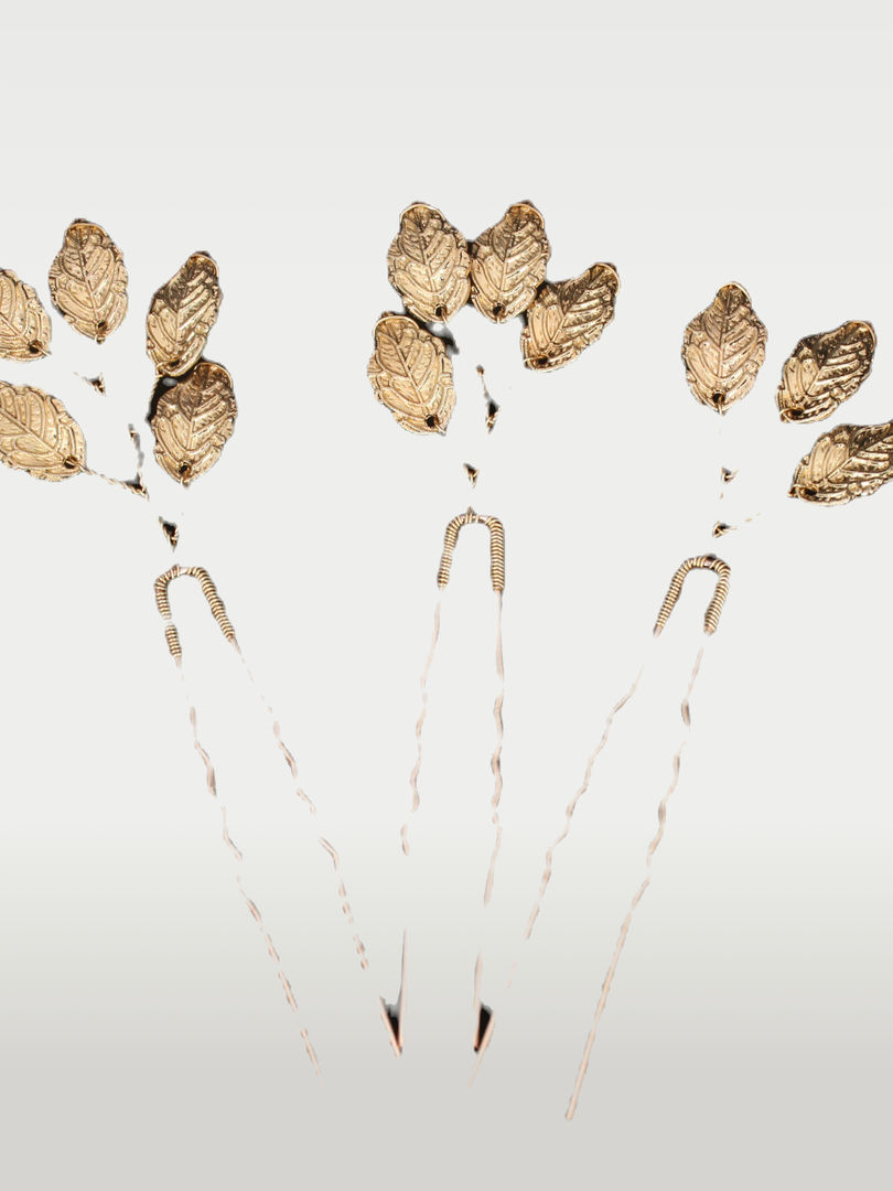 Pair of silver metal hair sticks with a round design Inspired by Cusuti's signature effortless style.