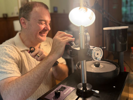 A man cutting a gem