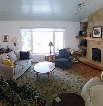 An open concept living room space with natural light.