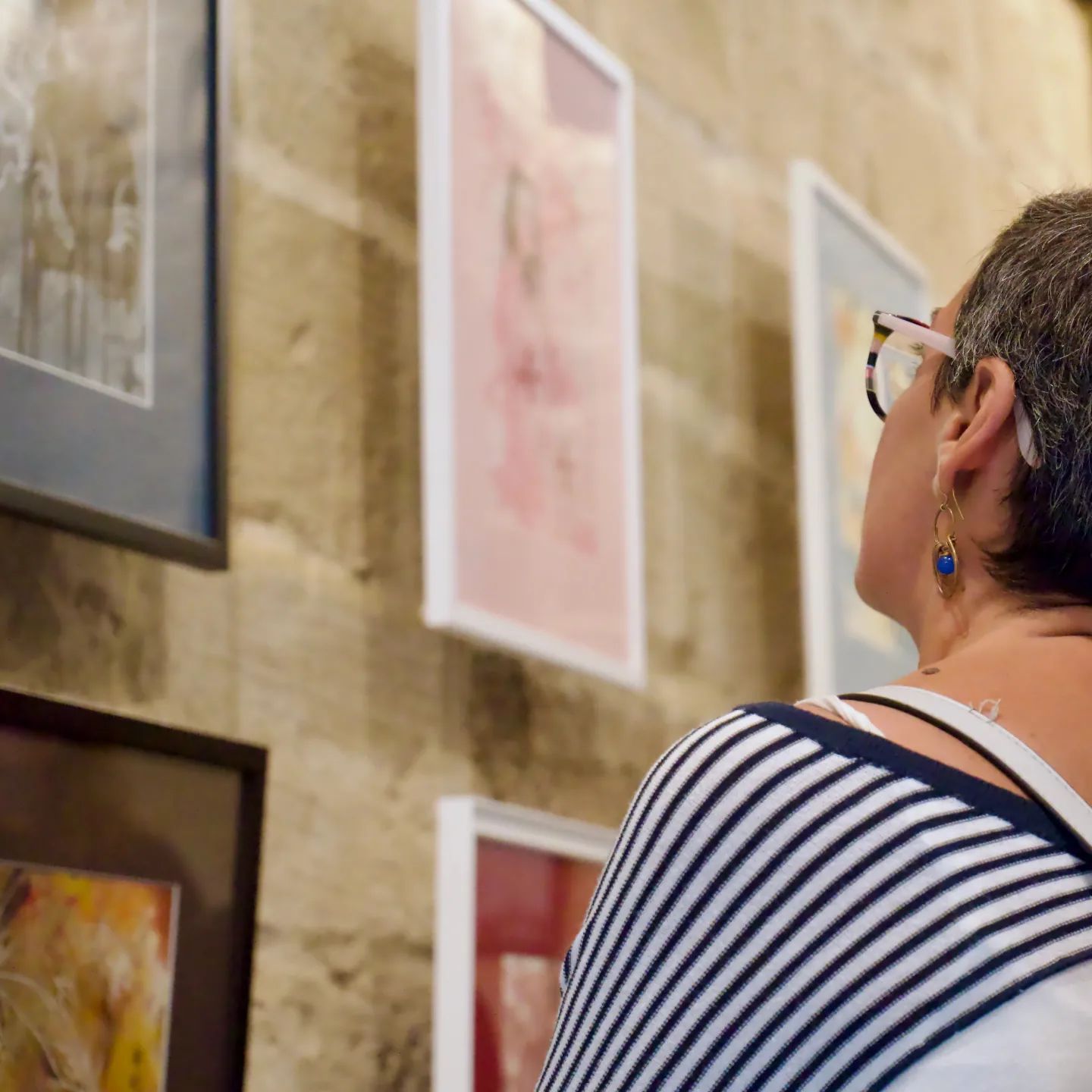 Picking a favourite artwork at the collective exhibition in Mosta