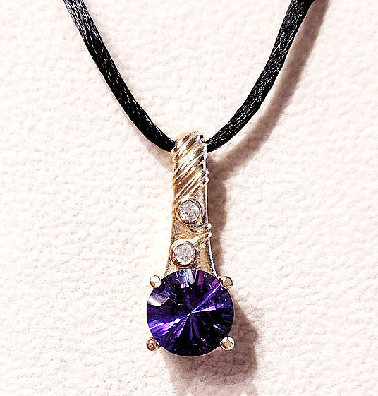 Concave Cut Amethyst and Diamond pendant