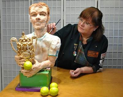 Food artist Jacqui Kelly showcases her Candy Murray statue at the launch of Wimbledon Art Fair