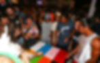 A group of lucky charity casino patrons hoping to win tokens