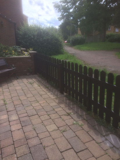 perimeter fence built and painted in front garden in stevenage