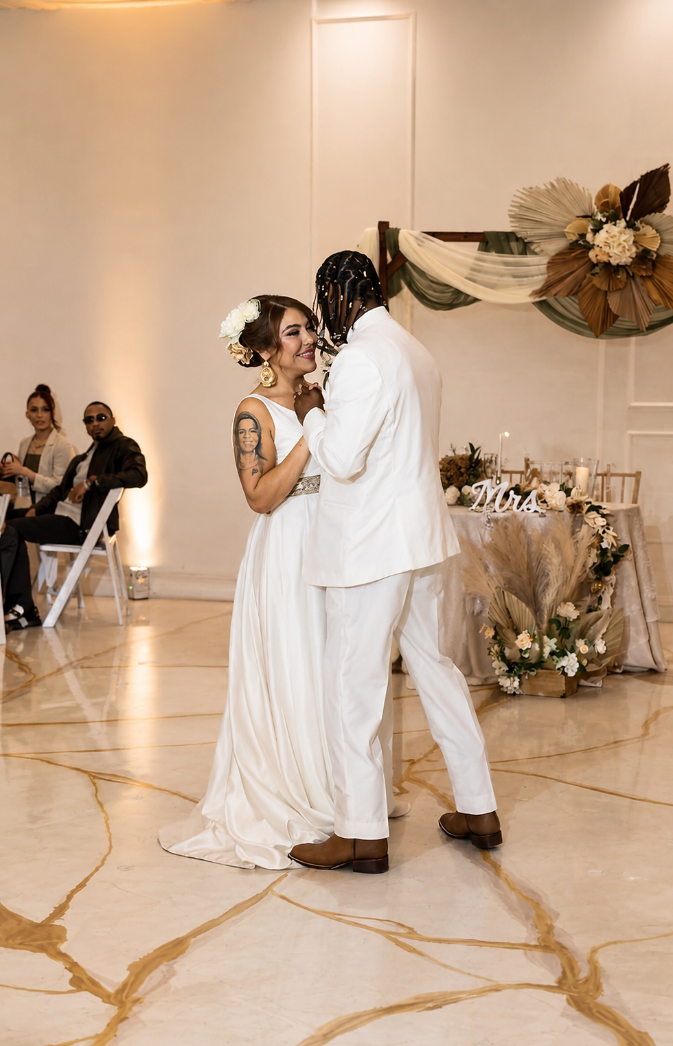 Newlyweds dancing to wedding dj entertainment at reception.