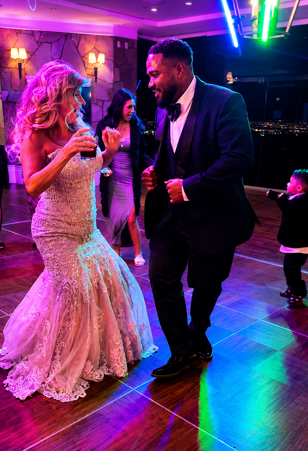 Wedding dj entertainment at a lively reception dance.