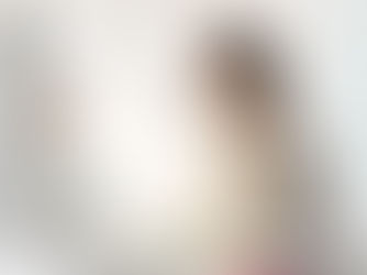 Lady with glasses looking at her desktop computer